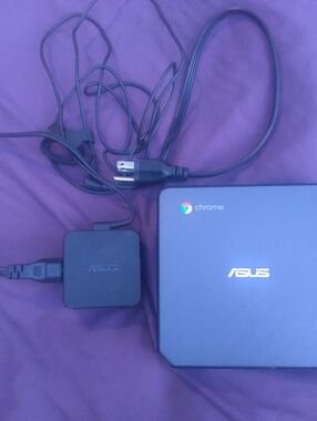 ASUS Chromebook in deep blue with charger